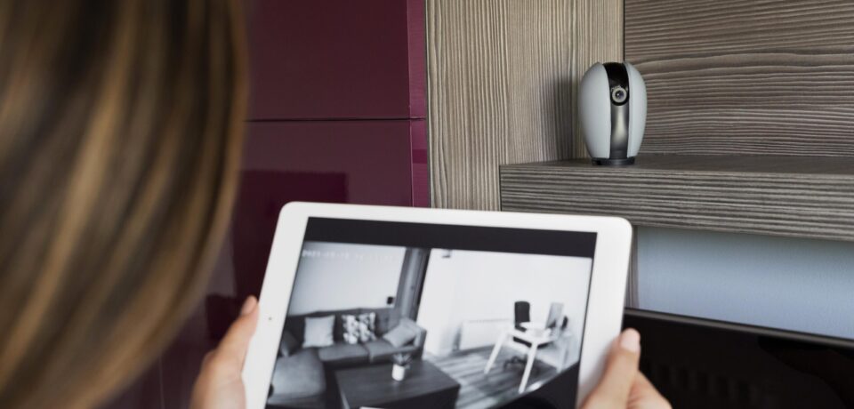 close-up-woman-checking-security-camera close-up-woman-checking-security-camera